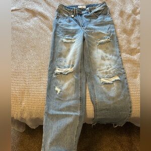 High waisted asymmetrical jean